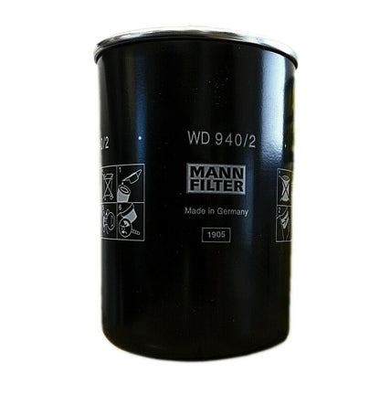 Black oil filter with 'MANN FILTER' branding on a white background